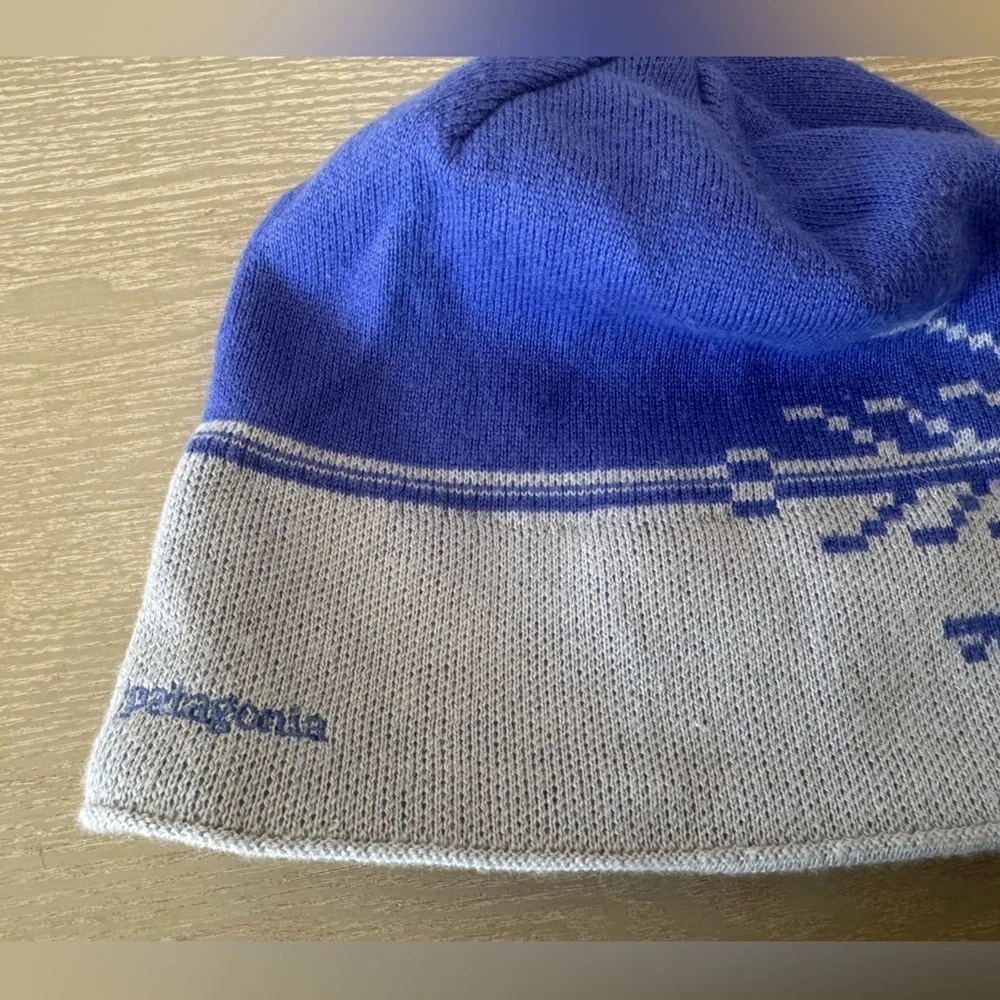 Patagonia Beanie Hat, snowflake design with small tassel top.